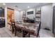 Bright dining room with table and chairs, adjacent to kitchen at 6713 Chambers Lake Ct, North Las Vegas, NV 89084