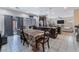 Open dining area with table and chairs, overlooks the living room and kitchen at 6713 Chambers Lake Ct, North Las Vegas, NV 89084