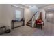 Stairwell and landing with tile flooring and bench seating at 6713 Chambers Lake Ct, North Las Vegas, NV 89084