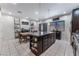 Spacious kitchen with island, granite counters, and stainless steel appliances at 6713 Chambers Lake Ct, North Las Vegas, NV 89084