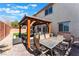 Backyard patio with gazebo and seating area at 6713 Chambers Lake Ct, North Las Vegas, NV 89084