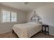 Cozy bedroom with double bed and window with plantation shutters at 7200 Big Rock Cir, Las Vegas, NV 89129