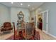 Elegant dining area with seating for four and access to living room at 7200 Big Rock Cir, Las Vegas, NV 89129