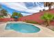 Private pool area with patio and lush landscaping at 7200 Big Rock Cir, Las Vegas, NV 89129