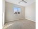 Bedroom with a bright window and neutral carpet at 7516 Evening Melody Ct, Las Vegas, NV 89178