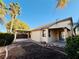 Landscaped backyard with patio cover at 773 Valley Rise Dr, Henderson, NV 89052