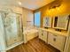 Elegant bathroom with double vanity, soaking tub, and walk-in shower at 773 Valley Rise Dr, Henderson, NV 89052