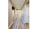 Long hallway with wood-look floors at 773 Valley Rise Dr, Henderson, NV 89052