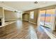 Bright and spacious living area with hardwood floors and backyard access at 773 Valley Rise Dr, Henderson, NV 89052