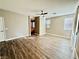 Main bedroom with hardwood floors, ceiling fan, and ensuite bathroom at 773 Valley Rise Dr, Henderson, NV 89052