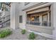 A ground floor patio with metal railing, tan canvas awning, and desert landscaping at 8250 N Grand Canyon Dr # 1040, Las Vegas, NV 89166