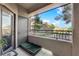 Cozy balcony with wrought iron railing and exterior views of the community at 8250 N Grand Canyon Dr # 1040, Las Vegas, NV 89166