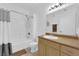 Bathroom featuring shower-tub combo with a vanity cabinet and lighting at 8250 N Grand Canyon Dr # 1040, Las Vegas, NV 89166