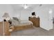 Bedroom featuring wooden furniture, ceiling fan, and neutral decor at 8250 N Grand Canyon Dr # 1040, Las Vegas, NV 89166