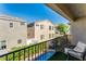 Relaxing balcony overlooking a sparkling pool and community at 8449 Kettledrum St, Las Vegas, NV 89139