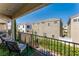 Private balcony offering views of neighboring homes and lush greenery at 8449 Kettledrum St, Las Vegas, NV 89139