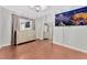 Well-lit bedroom with dresser, large mirror, and flat-screen TV at 8449 Kettledrum St, Las Vegas, NV 89139