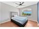 Serene bedroom, featuring a queen bed, ceiling fan and window at 8449 Kettledrum St, Las Vegas, NV 89139