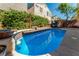 Refreshing blue pool with surrounding patio at 8449 Kettledrum St, Las Vegas, NV 89139