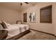 Cozy bedroom featuring neutral tones, a ceiling fan, and carpet at 8560 Foundry Branch Ln, Las Vegas, NV 89113