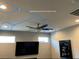 Living room with updated ceiling fan and upgraded ceiling lighting throughout the house at 8560 Foundry Branch Ln, Las Vegas, NV 89113