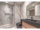 Stylish bathroom with glass shower, sleek black fixtures, and modern vanity at 8808 Rozetta Ct, Las Vegas, NV 89134