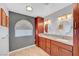 Bathroom boasts double sinks with granite countertop, and recessed lighting at 8908 Rocky Shore Dr, Las Vegas, NV 89117