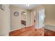 Hallway with wood floors and access to bathroom at 8908 Rocky Shore Dr, Las Vegas, NV 89117