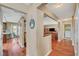 Hallway that leads to the living room, laundry area, and a door that opens to a patio at 8908 Rocky Shore Dr, Las Vegas, NV 89117