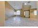 Bright living room features high ceilings, clerestory windows, neutral paint, and tile floors at 928 Allure Dr, Las Vegas, NV 89128