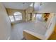 Wide shot of living room and open floor plan with clerestory windows and neutral decor at 928 Allure Dr, Las Vegas, NV 89128