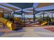 Community playground featuring slides and shade canopies for outdoor fun at 928 Allure Dr, Las Vegas, NV 89128