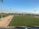 A green turf playing field for sports and recreation under a clear blue sky at 928 Allure Dr, Las Vegas, NV 89128