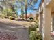 View of the well-maintained backyard with desert landscaping at 9437 January Dr, Las Vegas, NV 89134