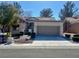 Attractive single-story home with desert landscaping and a two-car garage at 9437 January Dr, Las Vegas, NV 89134