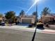 Charming one-story home with a two-car garage and desert landscaping at 9437 January Dr, Las Vegas, NV 89134