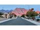 Street view of the neighborhood with scenic mountain views at sunset at 9437 January Dr, Las Vegas, NV 89134