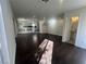 Hardwood floors span this living room, flowing into the kitchen, with a conveniently located half-bath at 9543 Antelope Bend Ct, Las Vegas, NV 89148