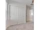 Bedroom closet features paneled doors with neutral colored plush carpets at 10089 Bismuth St, Las Vegas, NV 89183