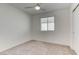 Bedroom features a ceiling fan, plush carpets and a large window at 10089 Bismuth St, Las Vegas, NV 89183
