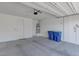 Spacious two car garage with concrete floors, offering plenty of room for parking and storage at 10089 Bismuth St, Las Vegas, NV 89183