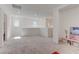 Large upstairs living space filled with natural light and ample room for lounging at 10089 Bismuth St, Las Vegas, NV 89183
