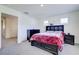 Well-lit bedroom with neutral tones, carpet flooring, and a comfortable, inviting atmosphere at 1132 Ruby Sparrow St, Henderson, NV 89011