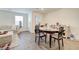 Cozy dining room features hard surface floors, a decorative table and seating for four at 1132 Ruby Sparrow St, Henderson, NV 89011