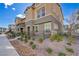 Attractive townhouse exterior with low maintenance landscaping and charming details at 1132 Ruby Sparrow St, Henderson, NV 89011