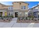 Charming home with a landscaped front yard, black fence, and inviting entryway at 1132 Ruby Sparrow St, Henderson, NV 89011