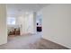 Loft area with neutral carpet, natural light, and bedroom view at 1132 Ruby Sparrow St, Henderson, NV 89011