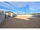 Large backyard with a storage shed and covered patio at 1312 W Van Buren Ave, Las Vegas, NV 89106