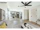 Bright living room featuring a ceiling fan, wood floors, and modern decor at 1312 W Van Buren Ave, Las Vegas, NV 89106