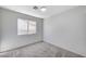 Bedroom with a cozy window and soft carpet at 2414 Inlet Beach Ct, North Las Vegas, NV 89031